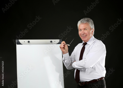 Senior businessman with fli...