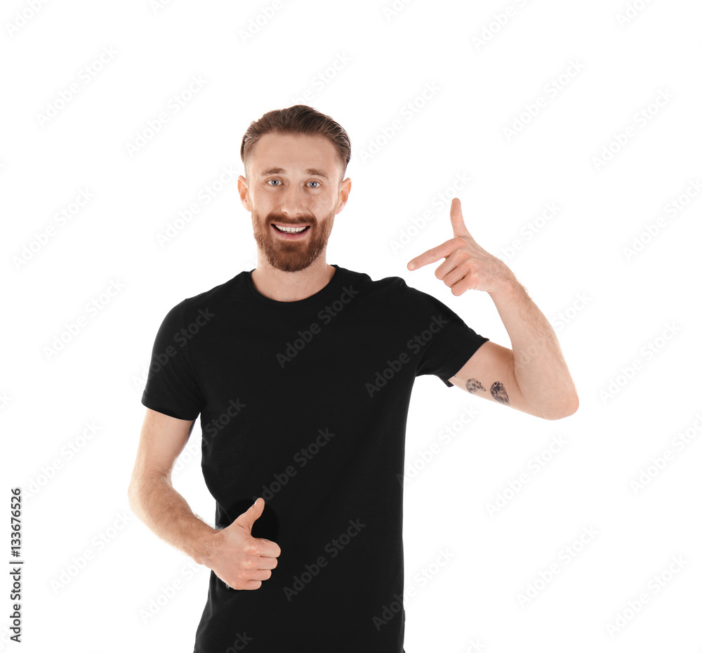 Young handsome man in black T-shirt isolated on white Young handsome man in black T-shirt isolated on white