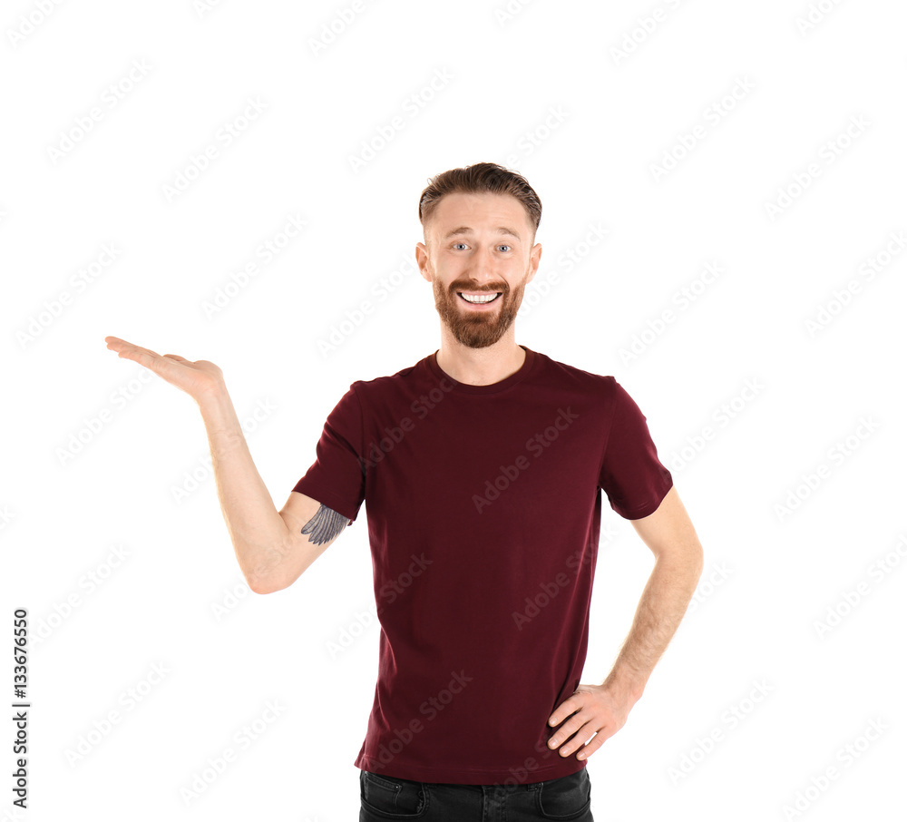 Young handsome man in claret red T-shirt isolated on white Young handsome man in claret red T-shirt isolated on white