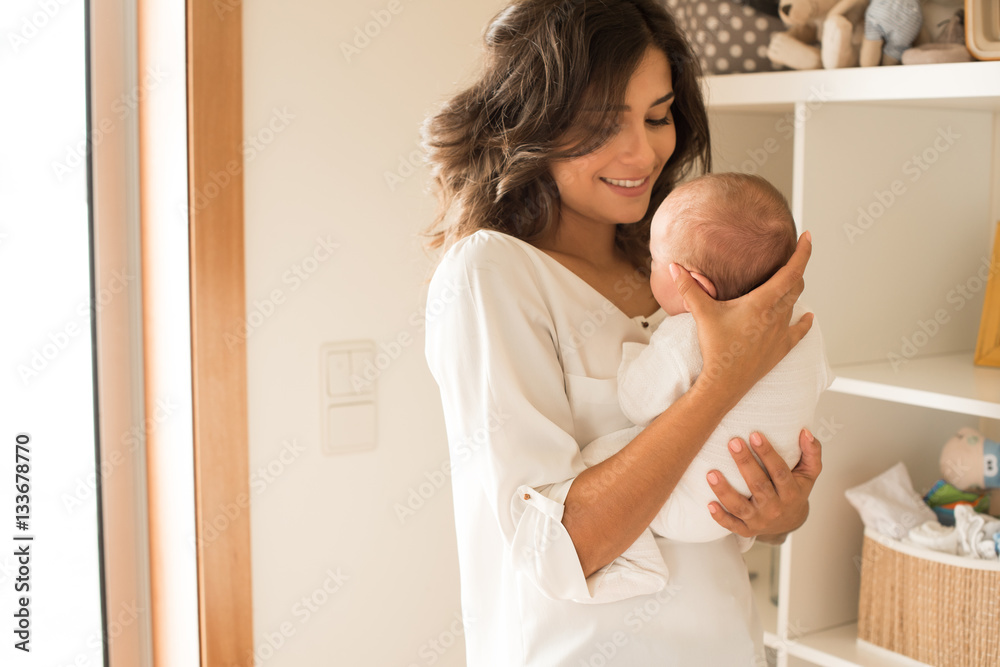 Woman with newborn baby Woman with newborn baby