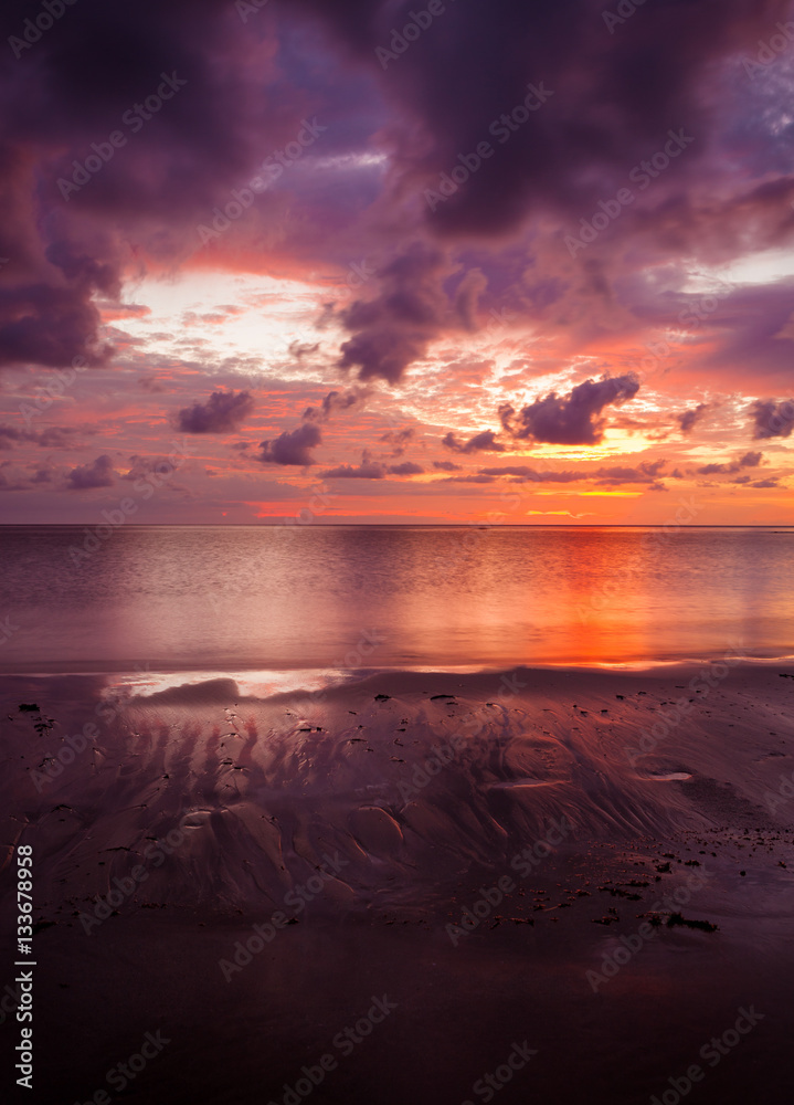 Colorful sunset at sand beach borneo