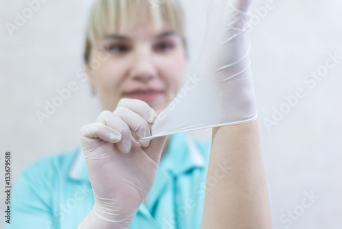doctor putting gloves