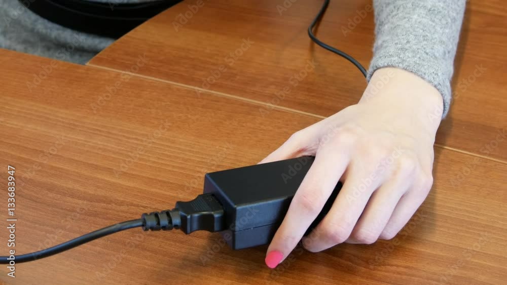 Unplugging and Plugging Cable to an Extension Cord Stock Video Adobe