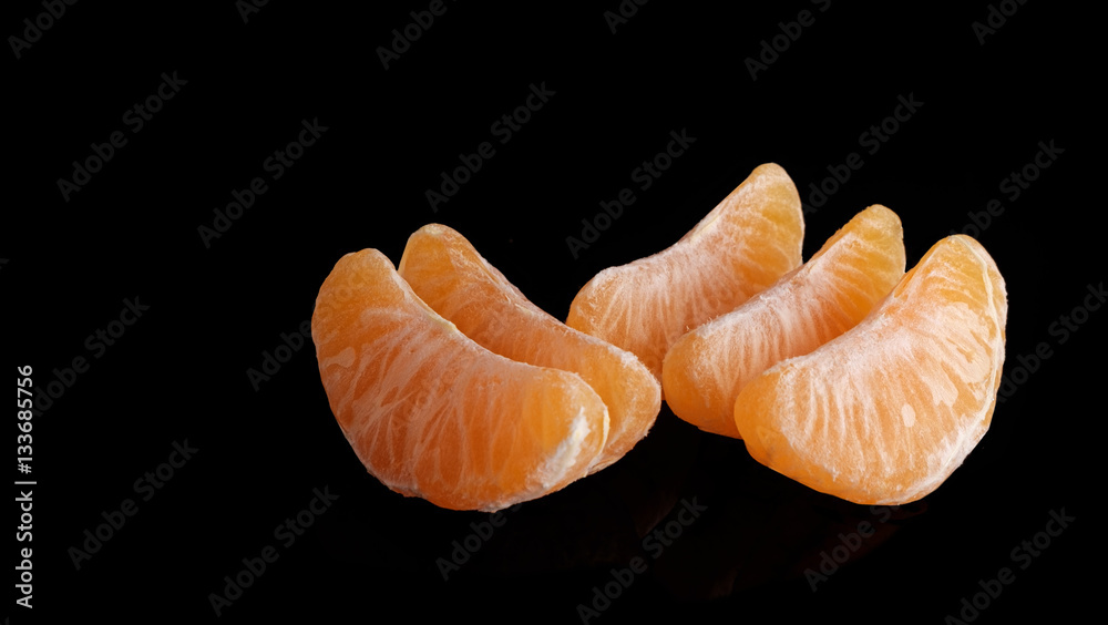 tangerine on black background tangerine on black background