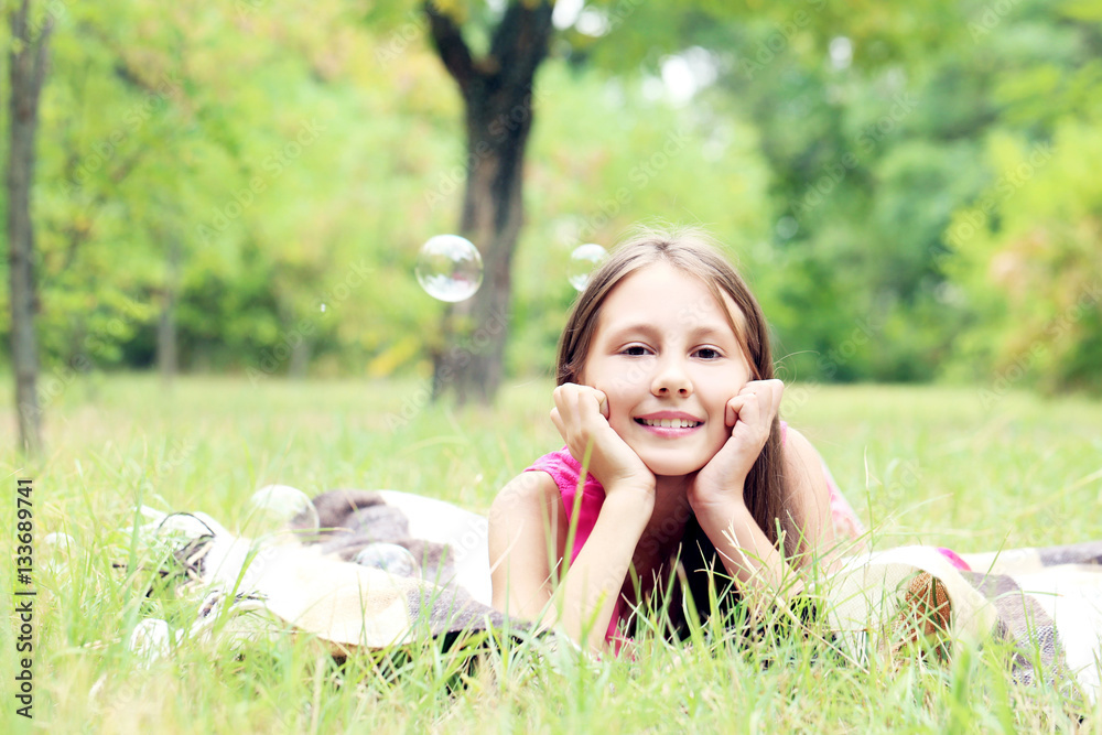 Portrait of little girl in the park Portrait of little girl in the park