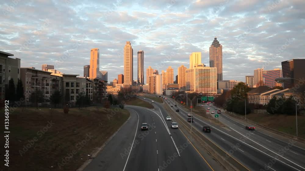 Modern sunrise cityscape with skyscrapers and highway. Atlanta, Georgia, USA. Modern sunrise cityscape with skyscrapers and highway. Atlanta, Georgia, USA.