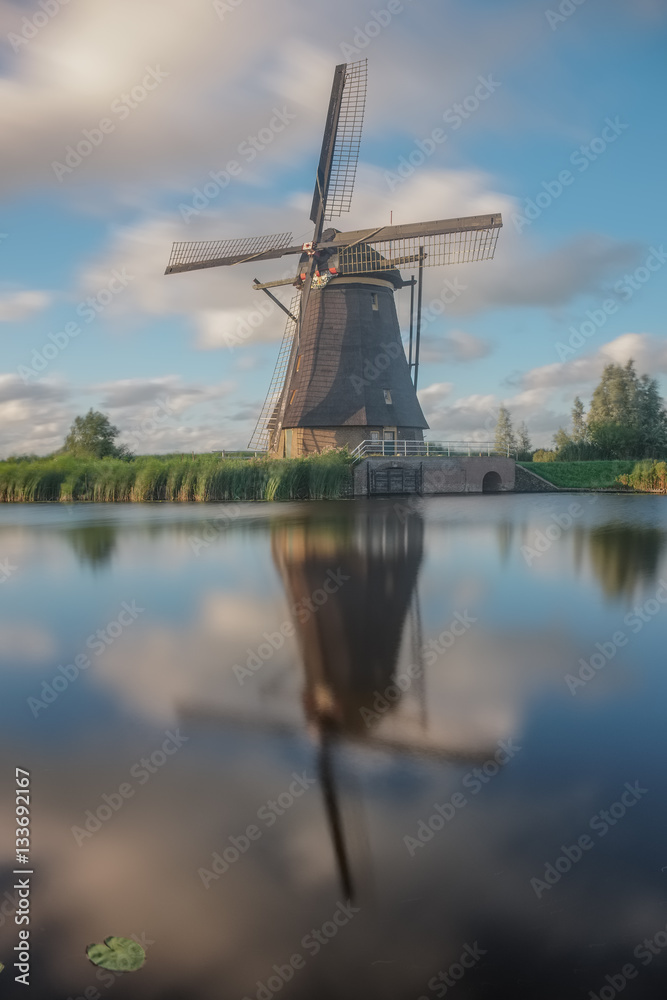 Long exposure photo of a windmill in Kinderdijk, the Netherlands