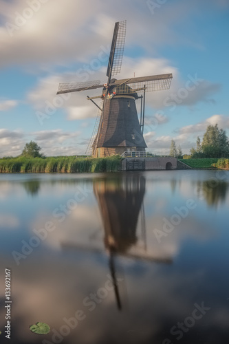 Long exposure photo of a windmill in Kinderdijk, the Netherlands