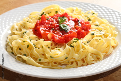 Fresh made pasta with simple tomatoes sauce