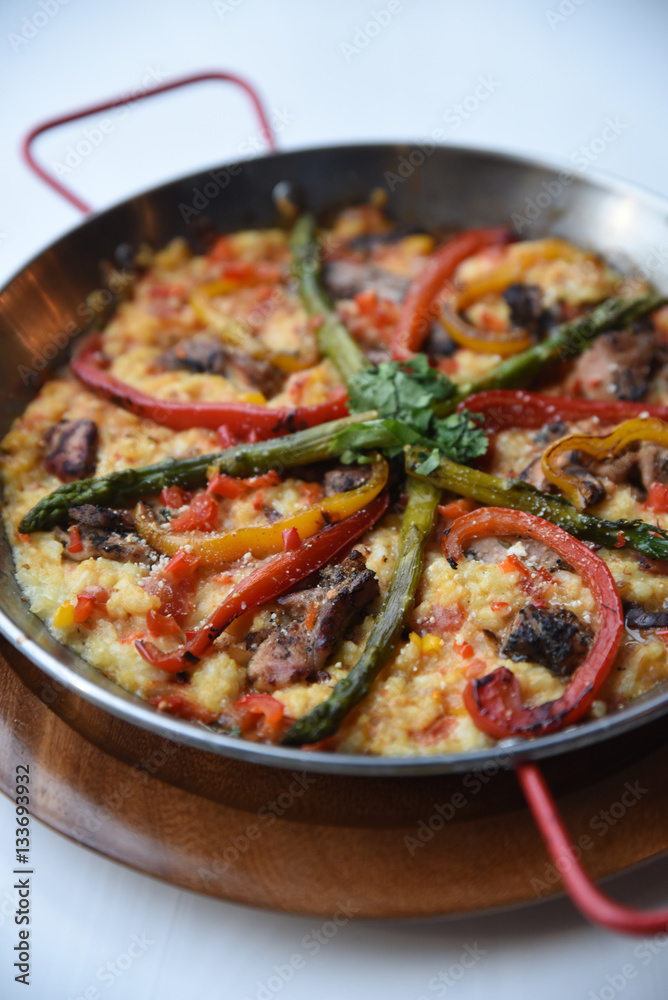 Cooked savoury dish of assorted vegetables Cooked savoury dish of assorted vegetables