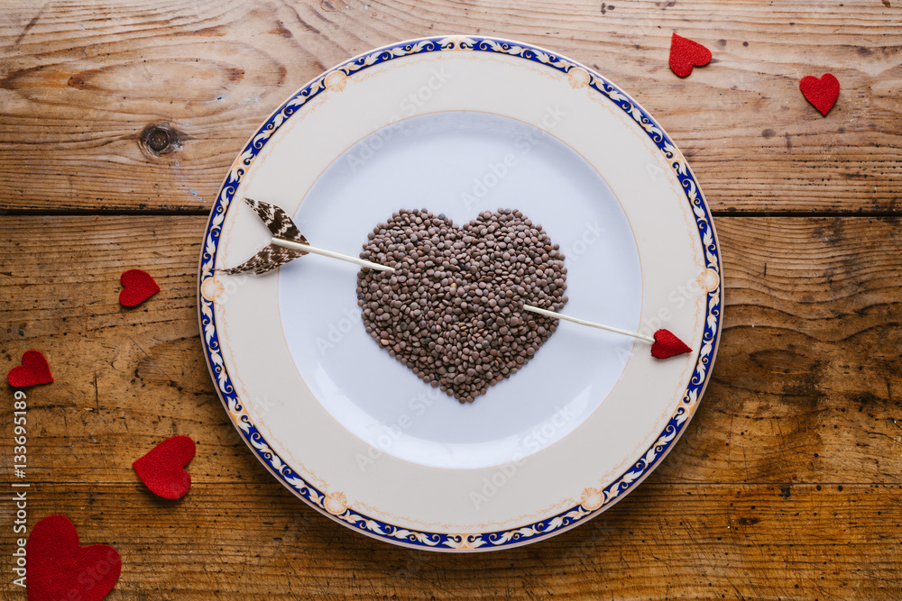 Dish with heart of lentils, valentines day