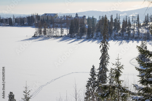 top view of frozen lake covered by snow