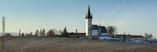 panorama with old cathedral under blue sky