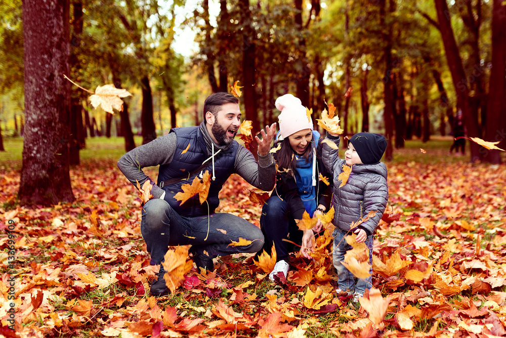happy family in autumn sity park
