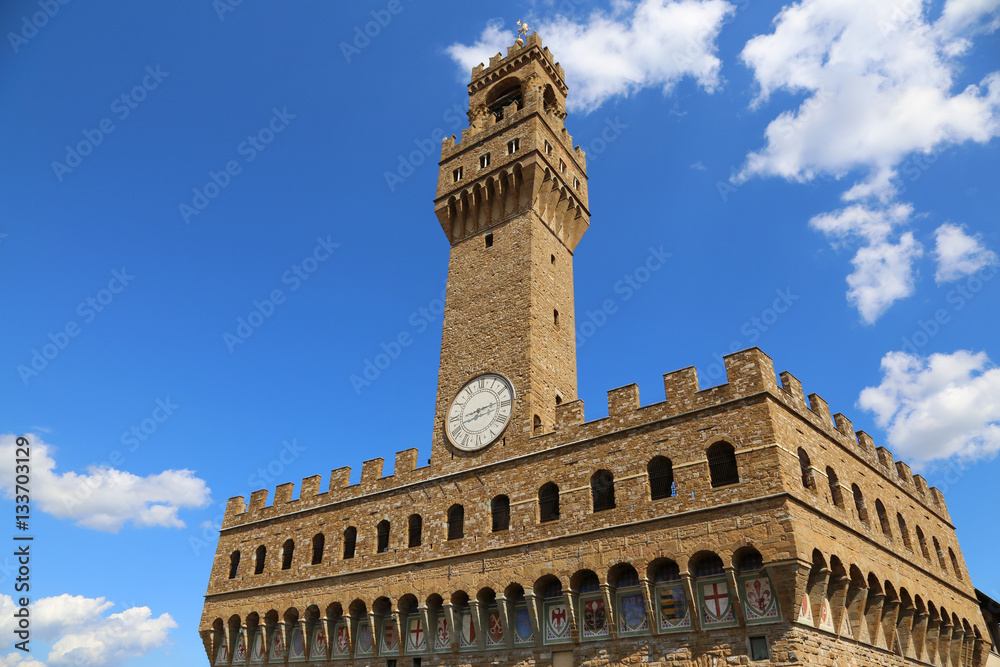 Old Palace called Palazzo Vecchio and clock tower in Florence It