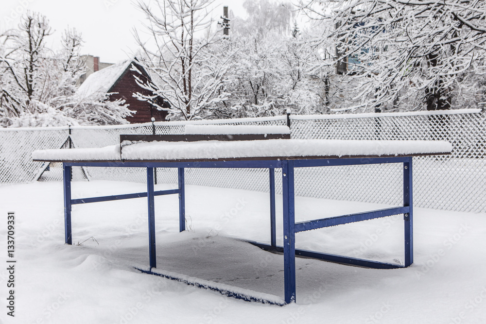 Outdoor ping-pong table in winter Outdoor ping-pong table in winter