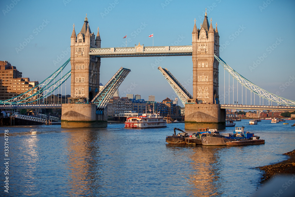 Fototapeta premium Tower Bridge raised to let ship pass through. London