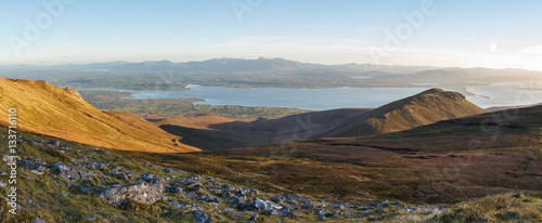 Looking South towards Castlemaine Harbour and MacGillycuddy Reeks from the slopes of Caherconree on an Autumn evening  County Kerry  Ireland