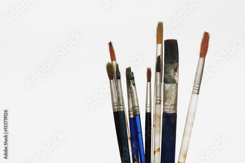 Set of different size paint brushes isolated on white