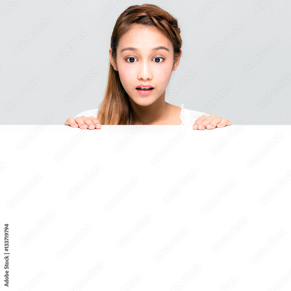 young girl staring something on the white table young girl staring something on the white table