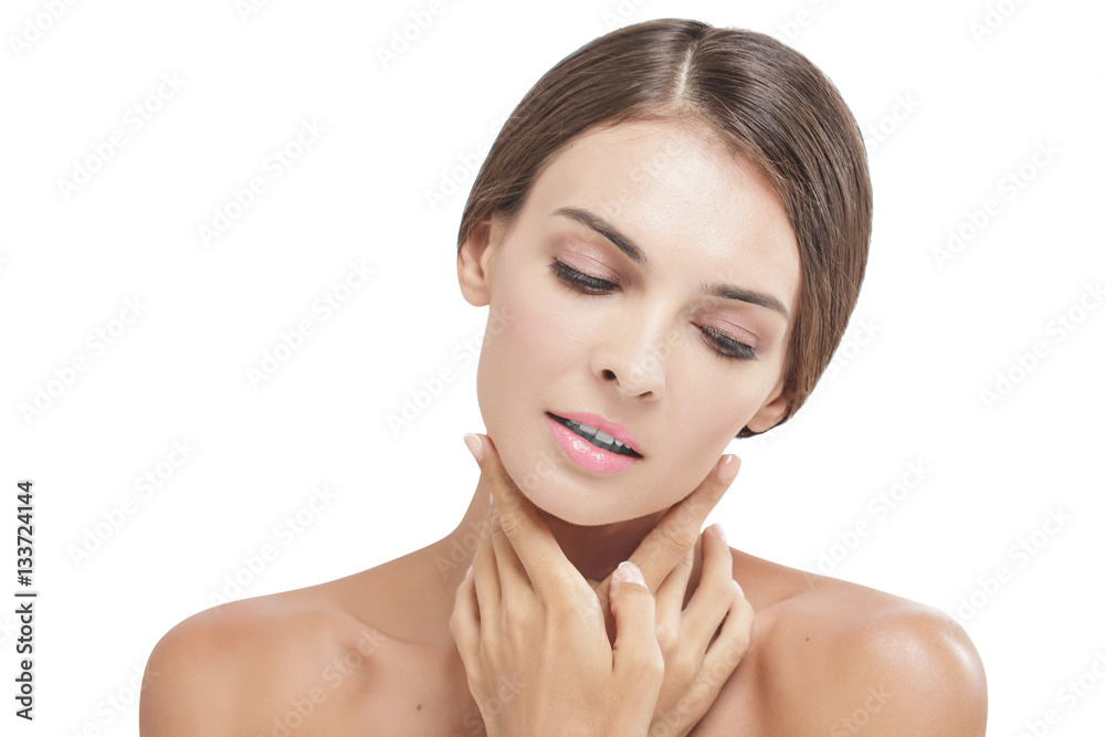 beautiful model with natural make up touching her soft skin beautiful model with natural make up touching her soft skin