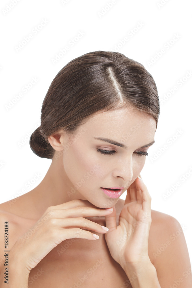 beautiful model with natural make up touching her soft skin face beautiful model with natural make up touching her soft skin face