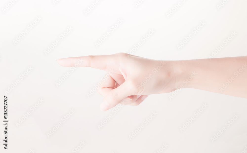 female hand pointing something isolated on white... female hand pointing something isolated on white...