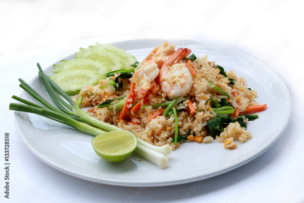 Delicious Shrimp fried rice. Unique style in the white dish on white background,  Thai food.