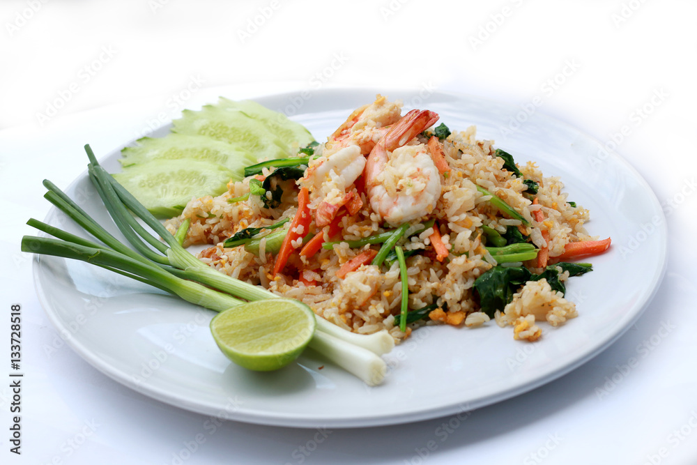 Delicious Shrimp fried rice. Unique style in the white dish on white background, Thai food. Delicious Shrimp fried rice. Unique style in the white dish on white background, Thai food.