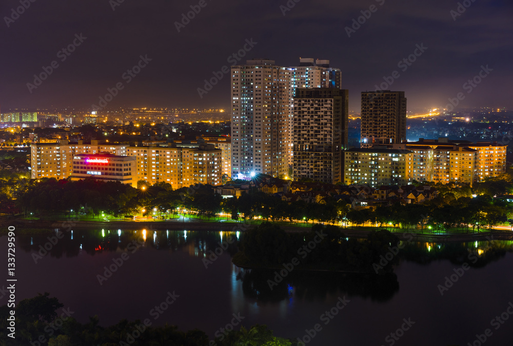 Aerial view of Hanoi skyline at West Lake ( Ho Tay in Vietnamese), at twilight