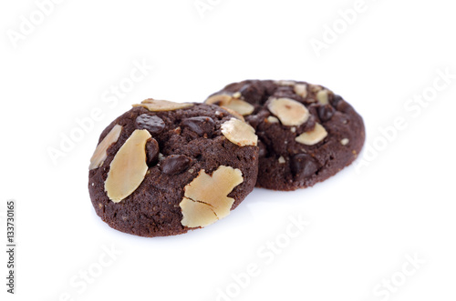 chocolate chip cookie with almond sliced on white background © yodaswaj