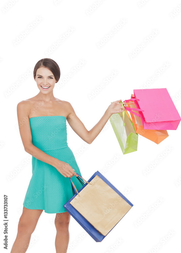 happy young shopping girl swinging shopping bag happy young shopping girl swinging shopping bag