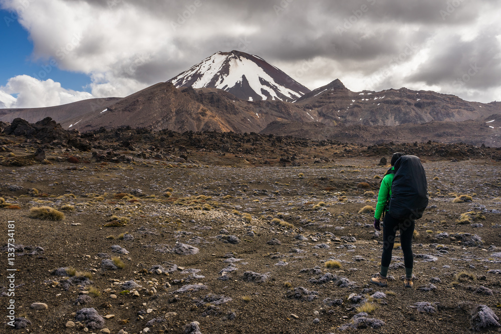 Woman hiker looking at Mt Ngauruhoe in Tongariro national park