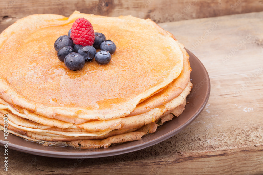 Crepes with honey and berries