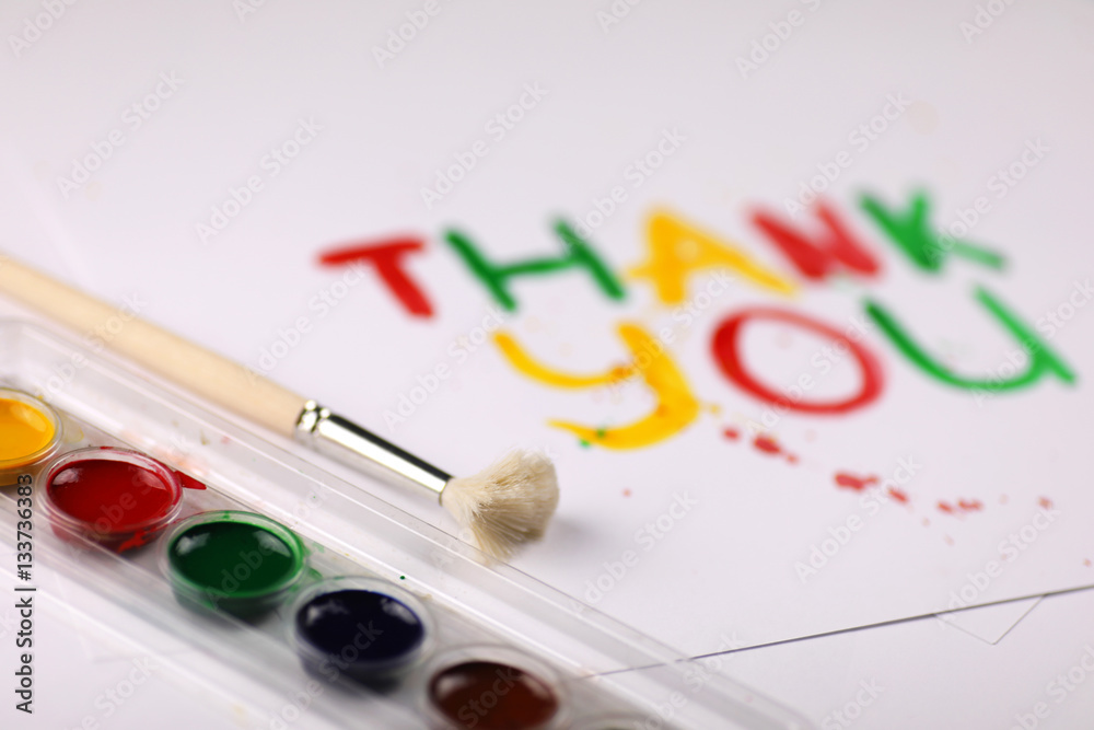inscription on white sheet of paper with watercolors inscription on white sheet of paper with watercolors