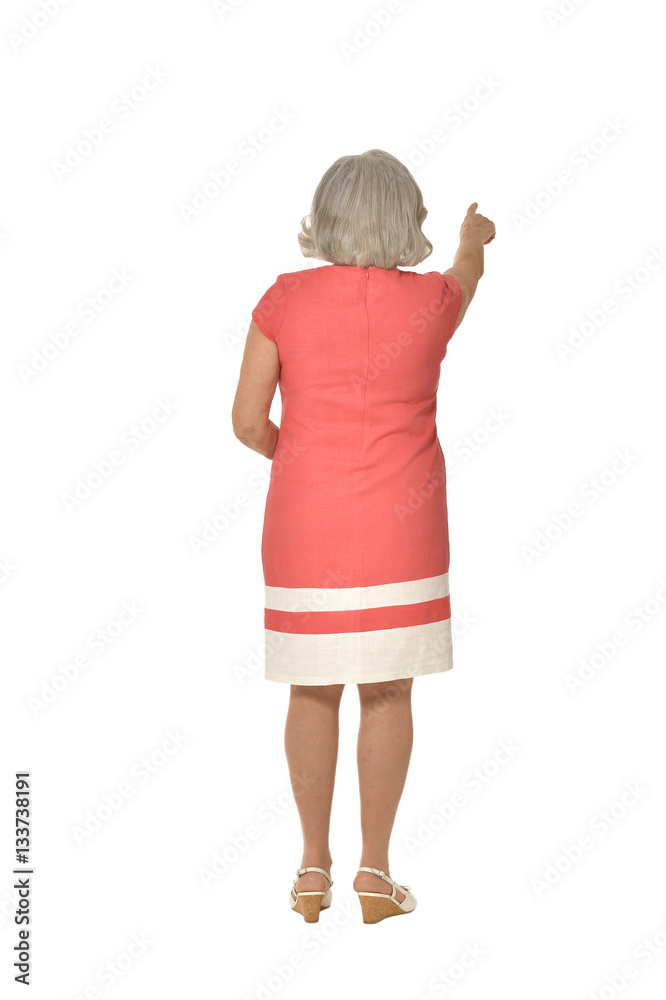 mature woman in pink dress mature woman in pink dress