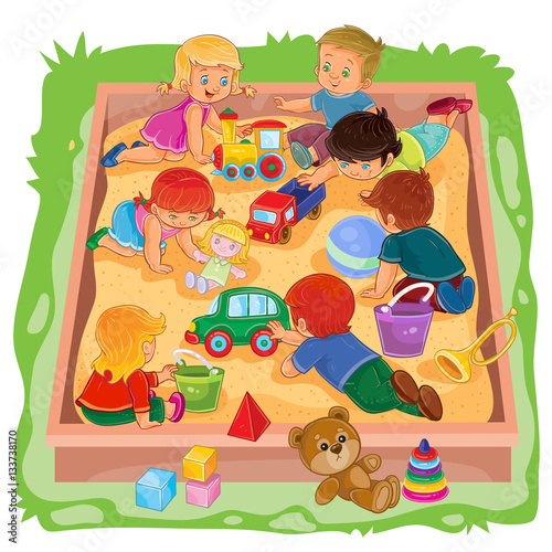 Little boys and girls sitting in the sandbox, play their toys