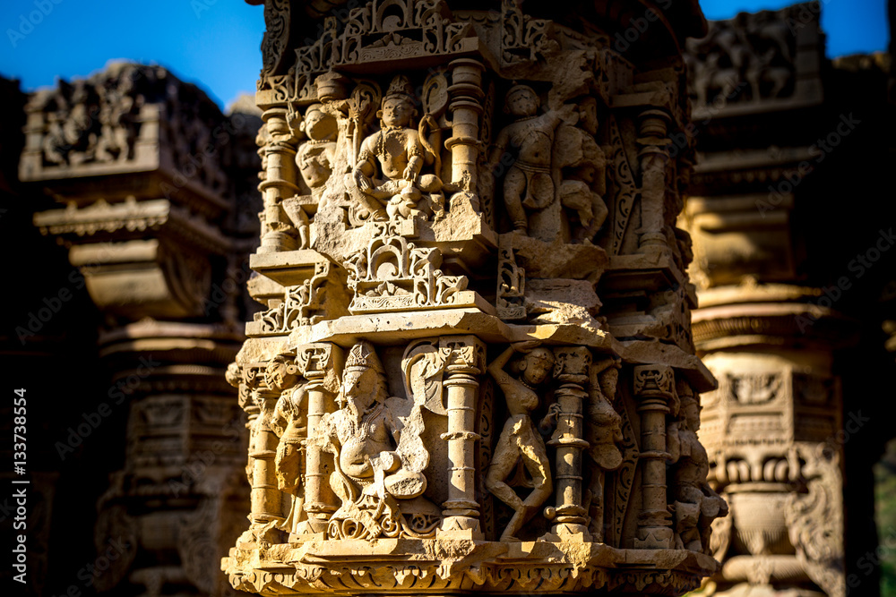 Beautiful sculptures of Hindu god and goddess carved on sandstone pillars in ancient cursed and haunted temple of Kiradu in Eleventh centuary
