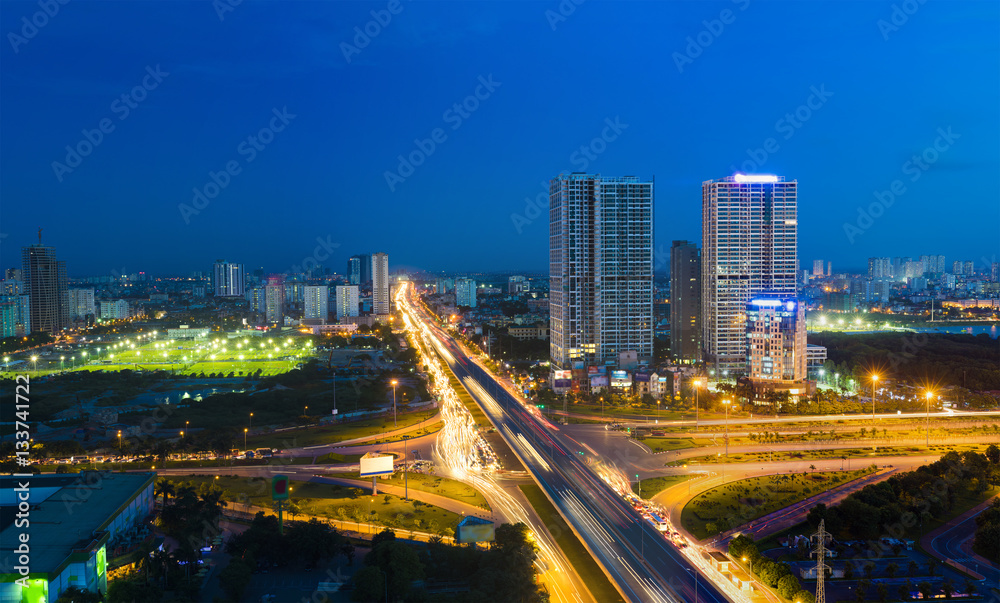 Aerial view of Hanoi cityscape at twilight in Le Van Luong street