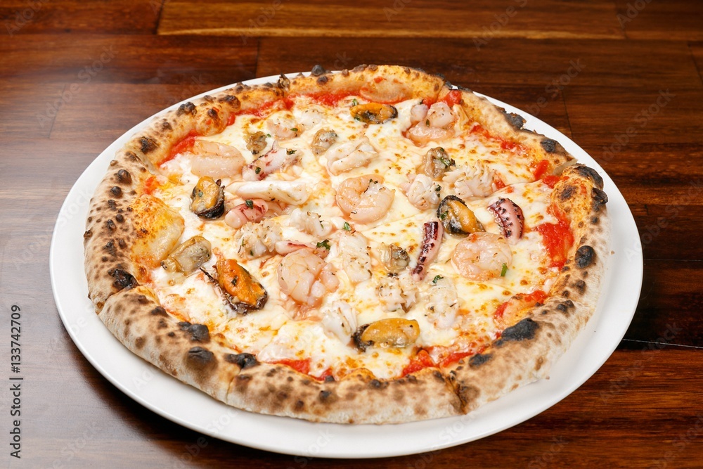 pesto pizza on table
