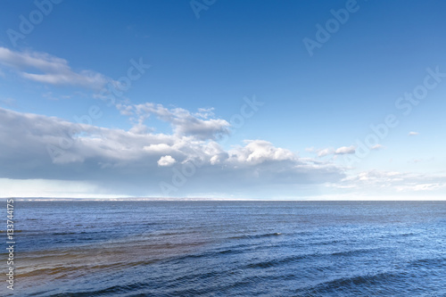 bright Sunny day / cloudy sky over water © ml1413