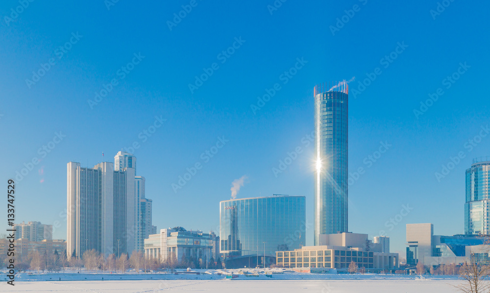 Embankment in Yekaterinburg winter on a sunny day