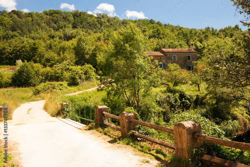 landscape with old croatian stone house in forest landscape with old croatian stone house in forest