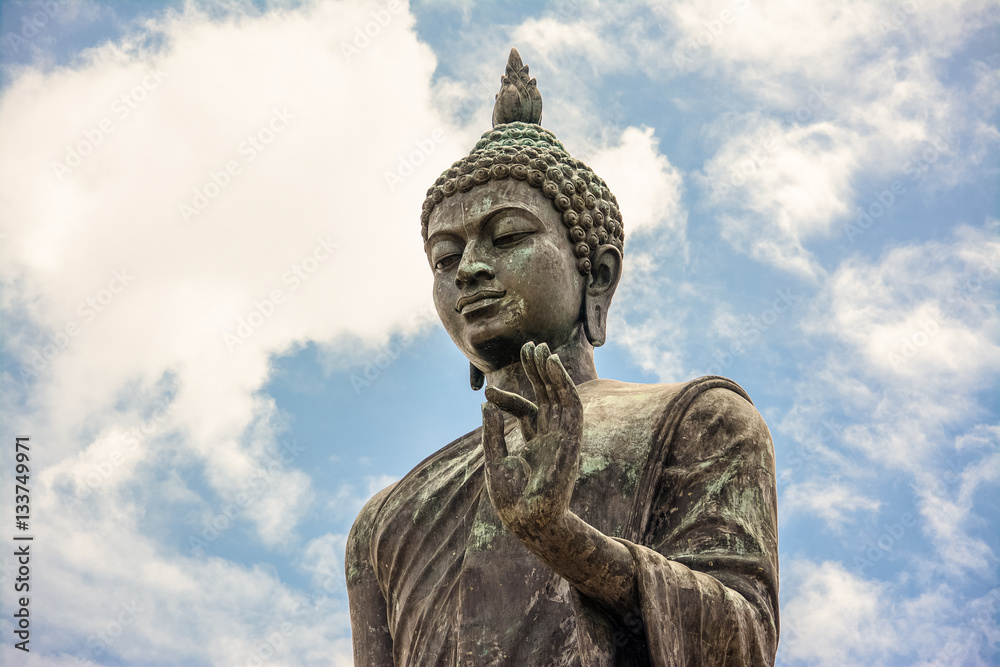 Phutthamonthon is a Buddhist park in Nakhon Pathom Province of Thailand. Highlighted by a 15.87 m high Buddha statue which is considered to be the tallest free-standing Buddha statue in the world Phutthamonthon is a Buddhist park in Nakhon Pathom Province of Thailand. Highlighted by a 15.87 m high Buddha statue which is considered to be the tallest free-standing Buddha statue in the world
