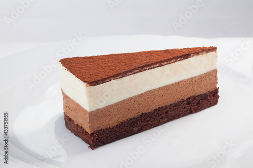 three chocolate cake slice isolated on white background