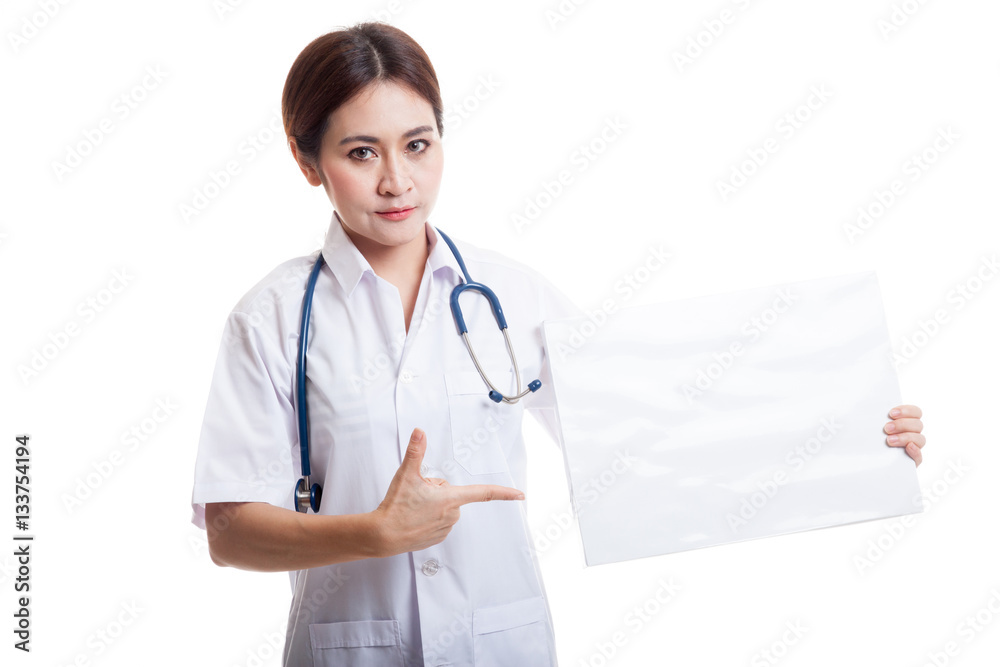 Young Asian female doctor point to a blank sign. Young Asian female doctor point to a blank sign.