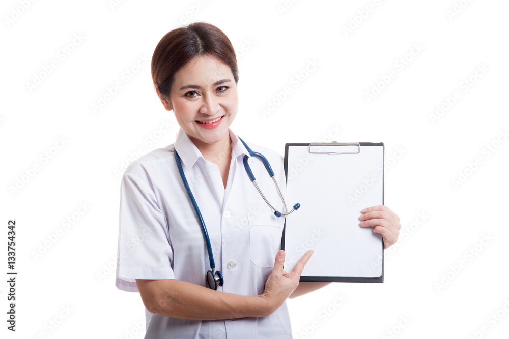 Young Asian female doctor point to a blank clipboard. Young Asian female doctor point to a blank clipboard.