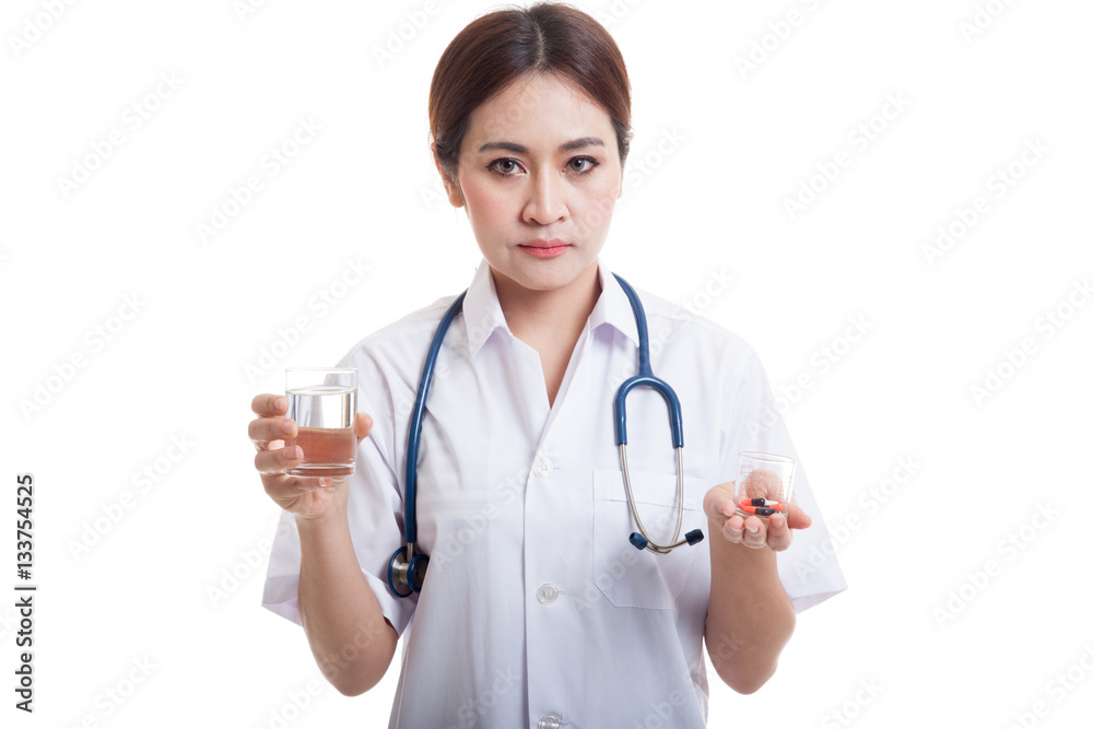 Young Asian female doctor with water and medicine. Young Asian female doctor with water and medicine.