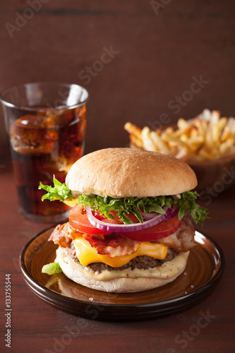 bacon cheese burger with beef patty tomato onion