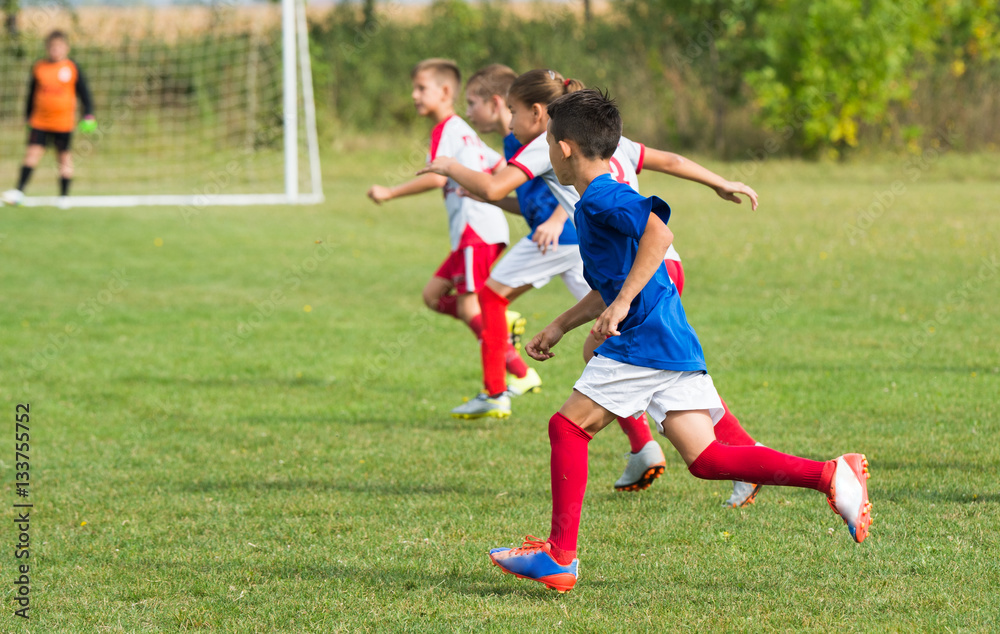  Boys kicking ball